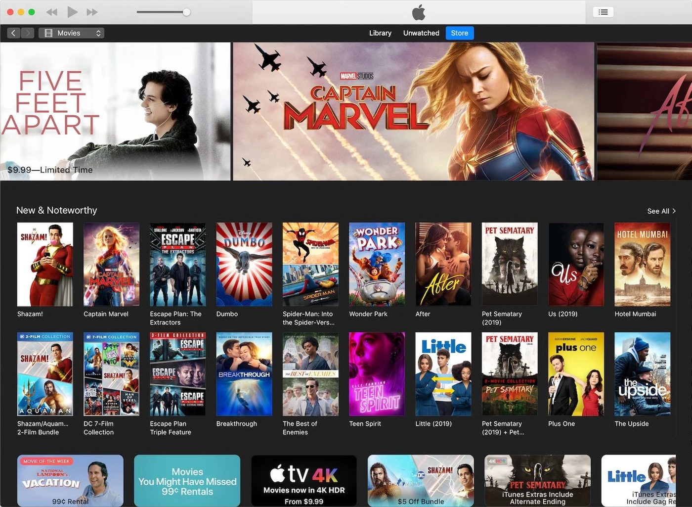 iTunes 12.9 showing a movie store crowded with promotional banners, dense rows of cover art, and stacked promo tiles running past the edges of the window.